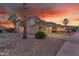 Two-story home featuring desert landscaping and a spacious driveway at 22491 W Woodlands Ave, Buckeye, AZ 85326