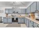 Spacious kitchen with stainless appliances and plenty of cabinet storage at 22491 W Woodlands Ave, Buckeye, AZ 85326