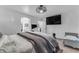 Spacious main bedroom features a large bed, ample natural light, and an en-suite bathroom, offering a private and relaxing retreat at 22491 W Woodlands Ave, Buckeye, AZ 85326