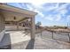 Covered patio offers desert views, ceiling fans, and shade, perfect for outdoor entertaining at 27145 N 147Th Ave, Surprise, AZ 85387