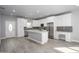 Bright and airy kitchen with a large island, stainless steel appliances, and ample counter space at 27145 N 147Th Ave, Surprise, AZ 85387