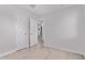 Neutral bedroom featuring vinyl floor and an open doorway to living area at 3035 W Pierce St, Phoenix, AZ 85009