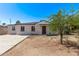 Charming single-story home featuring a well-maintained exterior and a neatly landscaped front yard at 3035 W Pierce St, Phoenix, AZ 85009