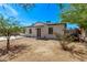 Charming single-story home featuring a well-maintained exterior and a neatly landscaped front yard at 3035 W Pierce St, Phoenix, AZ 85009
