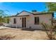 Charming single-story home featuring a well-maintained exterior and a neatly landscaped front yard at 3035 W Pierce St, Phoenix, AZ 85009