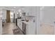 Spacious kitchen featuring stainless steel appliances and white shaker cabinets at 3035 W Pierce St, Phoenix, AZ 85009