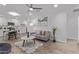 The living room showcases contemporary furnishings, a ceiling fan, and warm, inviting lighting at 3035 W Pierce St, Phoenix, AZ 85009