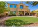 A large backyard with a grassy area and mature landscaping enhances the home's appeal and outdoor space at 3103 S Dakota Pl, Chandler, AZ 85248