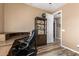 Cozy office with built-in desk, comfortable chair, and a view to an adjacent room at 3103 S Dakota Pl, Chandler, AZ 85248