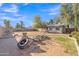 Expansive backyard with a variety of landscaping elements at 3349 E Carmel Ave, Mesa, AZ 85204