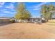 Large backyard featuring a grill and ample space for outdoor activities at 3349 E Carmel Ave, Mesa, AZ 85204