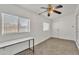 Bright living room featuring natural light with tile floor and ceiling fan at 3349 E Carmel Ave, Mesa, AZ 85204