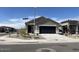 Charming single-story home featuring a two-car garage and low-maintenance landscaping at 36638 W Santa Clara Ave, Maricopa, AZ 85138