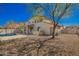 Enjoy the spacious backyard with covered patio, barbecue area and pool for outdoor activities at 3730 E Diamond Ct, Gilbert, AZ 85297