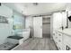 Modern bathroom with a glass shower, soaking tub, double vanity, and sliding door closet at 3730 E Diamond Ct, Gilbert, AZ 85297