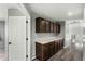 Hallway with built-in cabinets and drawers providing extra storage space and convenience at 3730 E Diamond Ct, Gilbert, AZ 85297