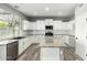 Kitchen view showing granite countertops, white cabinets, and stainless steel appliances at 3730 E Diamond Ct, Gilbert, AZ 85297