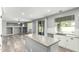 Kitchen island and dining area, seamlessly integrated with the living area at 3730 E Diamond Ct, Gilbert, AZ 85297