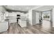 A kitchen view, highlighting the white cabinets and island at 3730 E Diamond Ct, Gilbert, AZ 85297