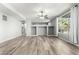 Open living room featuring hard surface floors and a neutral color palette at 3730 E Diamond Ct, Gilbert, AZ 85297