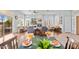 Elegant dining area with fireplace and seamless windows at 42047 N Moss Springs Rd, Anthem, AZ 85086