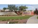 Anthem by Del Webb entryway with cascading waterfall and lush landscaping creates a welcoming community entrance at 42047 N Moss Springs Rd, Anthem, AZ 85086