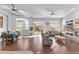 Inviting living room with hardwood floors, an open layout, and plenty of natural light, creating a warm and welcoming space at 42047 N Moss Springs Rd, Anthem, AZ 85086
