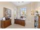 Comfortable office space with ample natural light and wood accents at 42047 N Moss Springs Rd, Anthem, AZ 85086