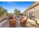 Charming backyard patio with a built-in barbeque and an outdoor kitchen at 42047 N Moss Springs Rd, Anthem, AZ 85086