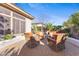 Inviting outdoor patio area with comfortable seating and manicured landscaping at 42047 N Moss Springs Rd, Anthem, AZ 85086