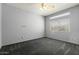 Bedroom featuring neutral walls, carpeted floors, and a ceiling fan at 4803 W Buckskin Trl, Phoenix, AZ 85083