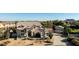 Exterior view of a stucco home featuring a desert landscape, tile roof and attached garage at 4803 W Buckskin Trl, Phoenix, AZ 85083