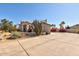 Inviting two-story house boasting desert landscaping, a tile roof, and a spacious driveway at 4803 W Buckskin Trl, Phoenix, AZ 85083