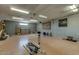 Spacious garage with ample storage and shelving, offering lots of potential for projects at 4803 W Buckskin Trl, Phoenix, AZ 85083