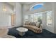 Bright living room with large windows and elegant furnishings, creating a welcoming atmosphere at 4803 W Buckskin Trl, Phoenix, AZ 85083