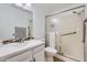 Bathroom featuring a glass shower, mosaic mirror, and toilet at 482 Leisure World --, Mesa, AZ 85206