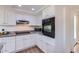 Bright kitchen featuring white cabinetry and modern appliances, ready for cooking and entertaining at 482 Leisure World --, Mesa, AZ 85206