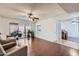 Spacious living room features hardwood floors, ceiling fan, and glass doors to outdoor patio at 482 Leisure World --, Mesa, AZ 85206