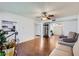 Open concept living room with hardwood floors and an airy, bright space for entertaining at 482 Leisure World --, Mesa, AZ 85206