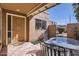 A charming outdoor patio space offers tile flooring and tranquil view through surrounding windows at 482 Leisure World --, Mesa, AZ 85206