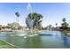 Water feature with fountains and palm trees at 482 Leisure World --, Mesa, AZ 85206