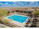 Aerial view of the community pool and lounge area near the clubhouse at 5189 N 206Th Dr, Buckeye, AZ 85396