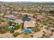Wide aerial view of desert neighborhood with houses and swimming pools at 5210 E Calle De Baca --, Cave Creek, AZ 85331