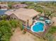 A large swimming pool is nestled between two homes with desert landscaping at 5210 E Calle De Baca --, Cave Creek, AZ 85331