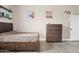 Bedroom featuring wood bed frame, vinyl floors, and ample natural light at 5210 E Calle De Baca --, Cave Creek, AZ 85331