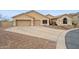 Exterior showcases an extra-wide driveway and meticulously manicured desert landscaping at 5210 E Calle De Baca --, Cave Creek, AZ 85331