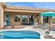 Spacious patio with comfortable seating area overlooking sparkling pool at 5210 E Calle De Baca --, Cave Creek, AZ 85331