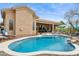Beautiful backyard pool with desert landscape, outdoor dining area, and lounging chairs at 5210 E Calle De Baca --, Cave Creek, AZ 85331