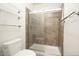 Modern bathroom featuring glass shower with tile surround and matching towel racks at 5303 N 7Th St # 101, Phoenix, AZ 85014