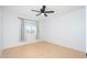 Bright bedroom with natural light from a window and a neutral color palette at 562 W Keats Ave, Mesa, AZ 85210